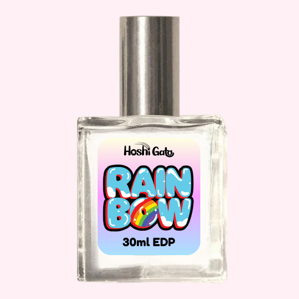 label with pastel rainbow background. Text reads "rainbow" in blue bubble letters.