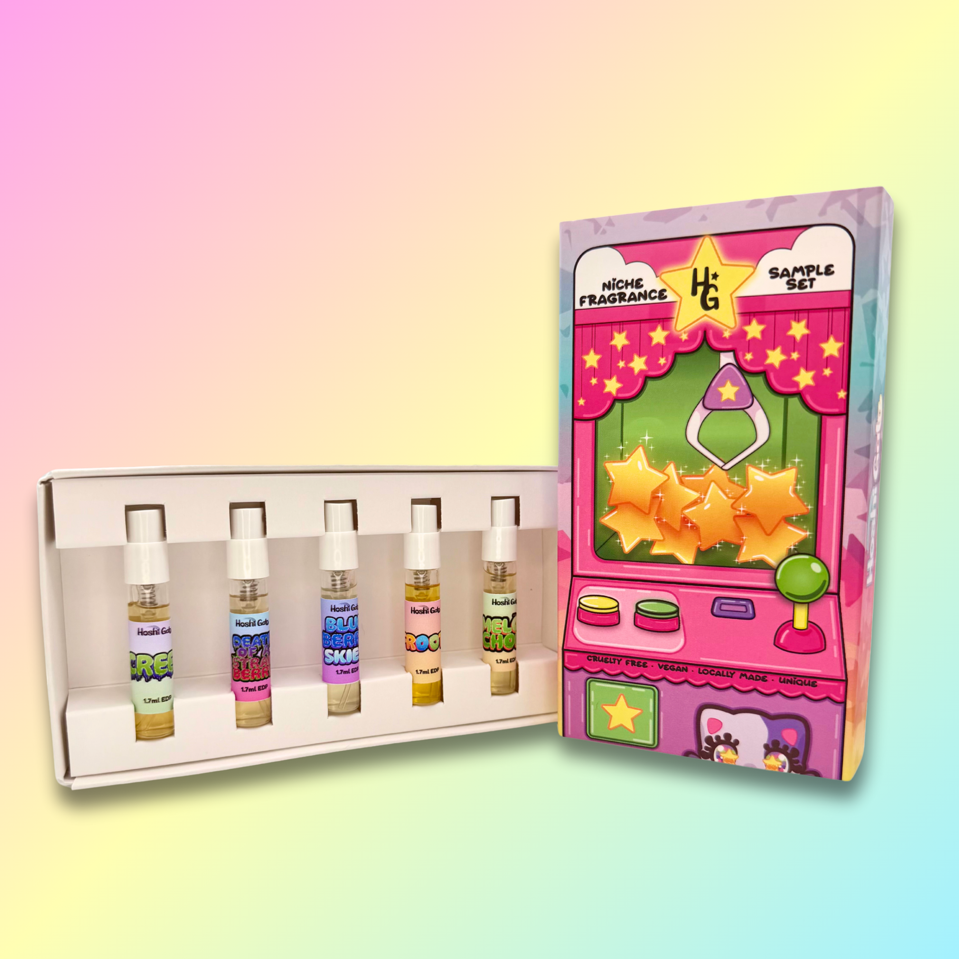 Set of samples with colorful labels next to a pink toy machine-themed box on a gradient background