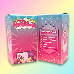 Colorful packaging of a perfume with 'Hoshi gato' branding on a gradient background