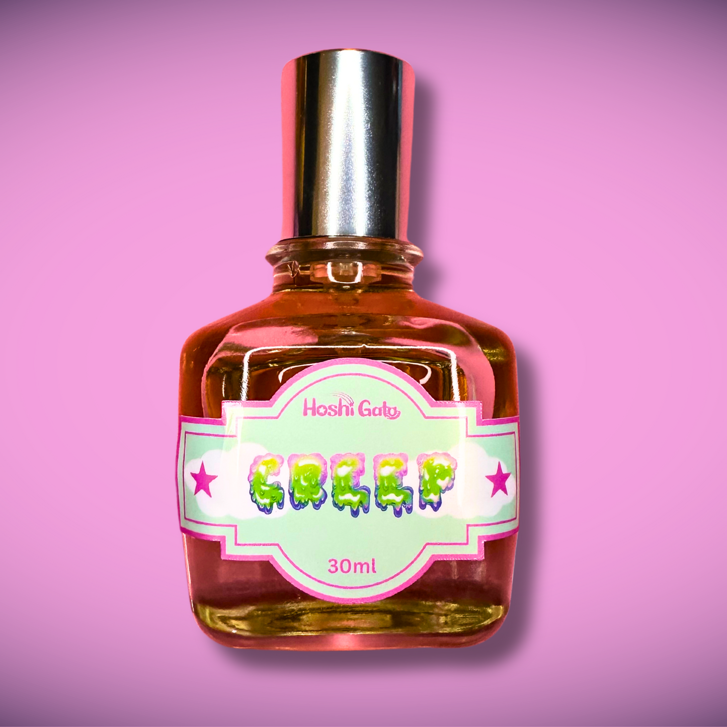 Bottle of creep on a pink background