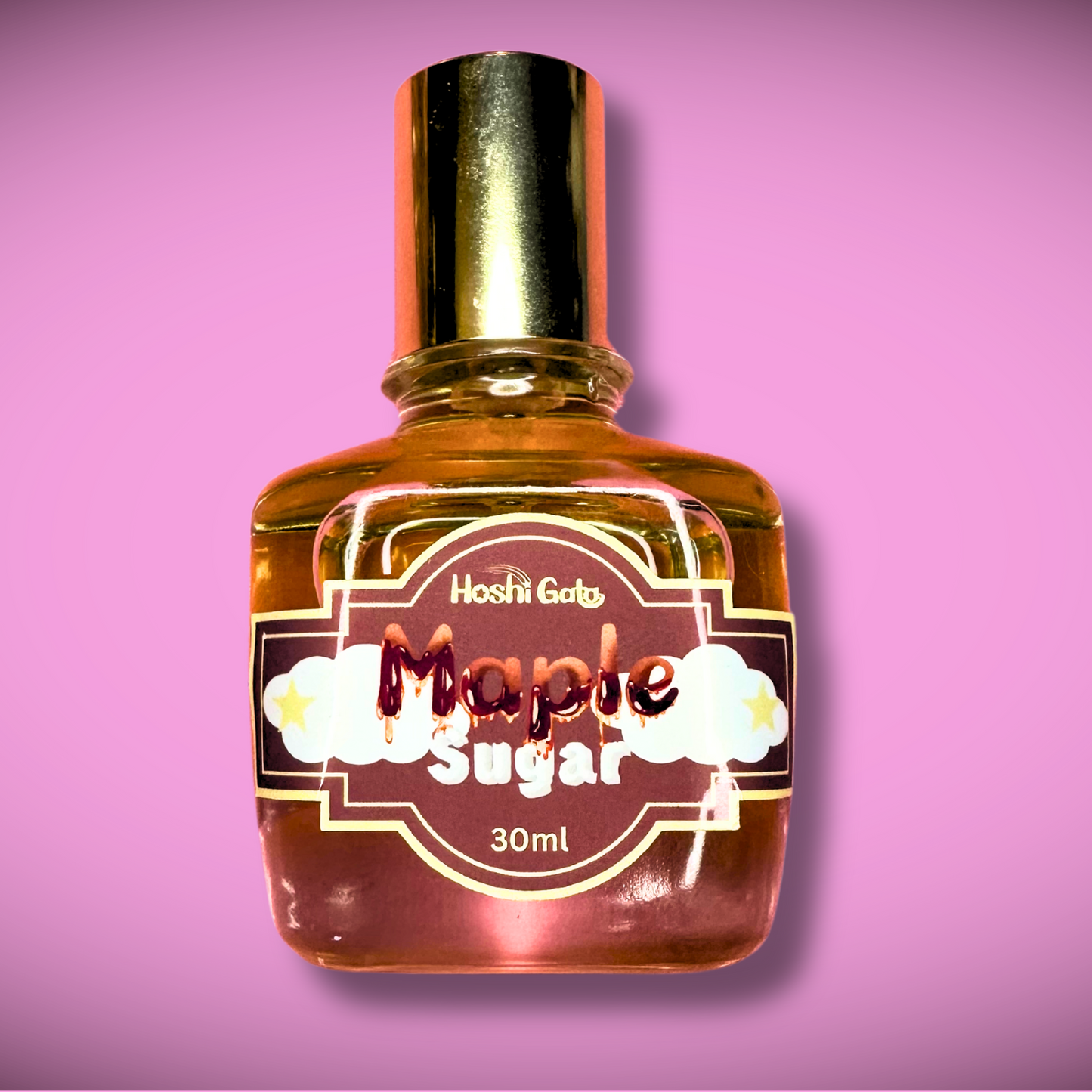 Bottle of Maple Sugar on a pink background