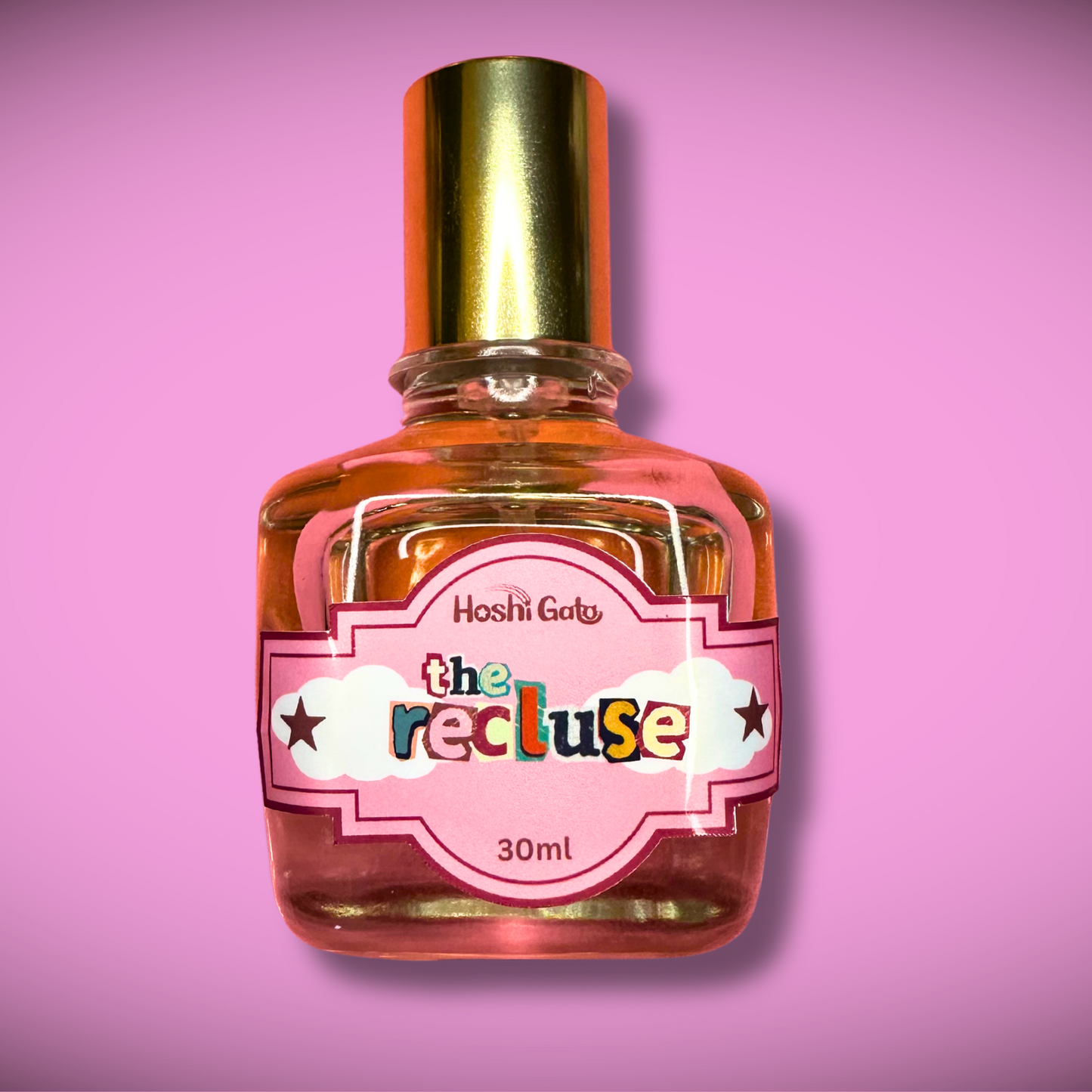 Bottle of The Recluse on a pink background