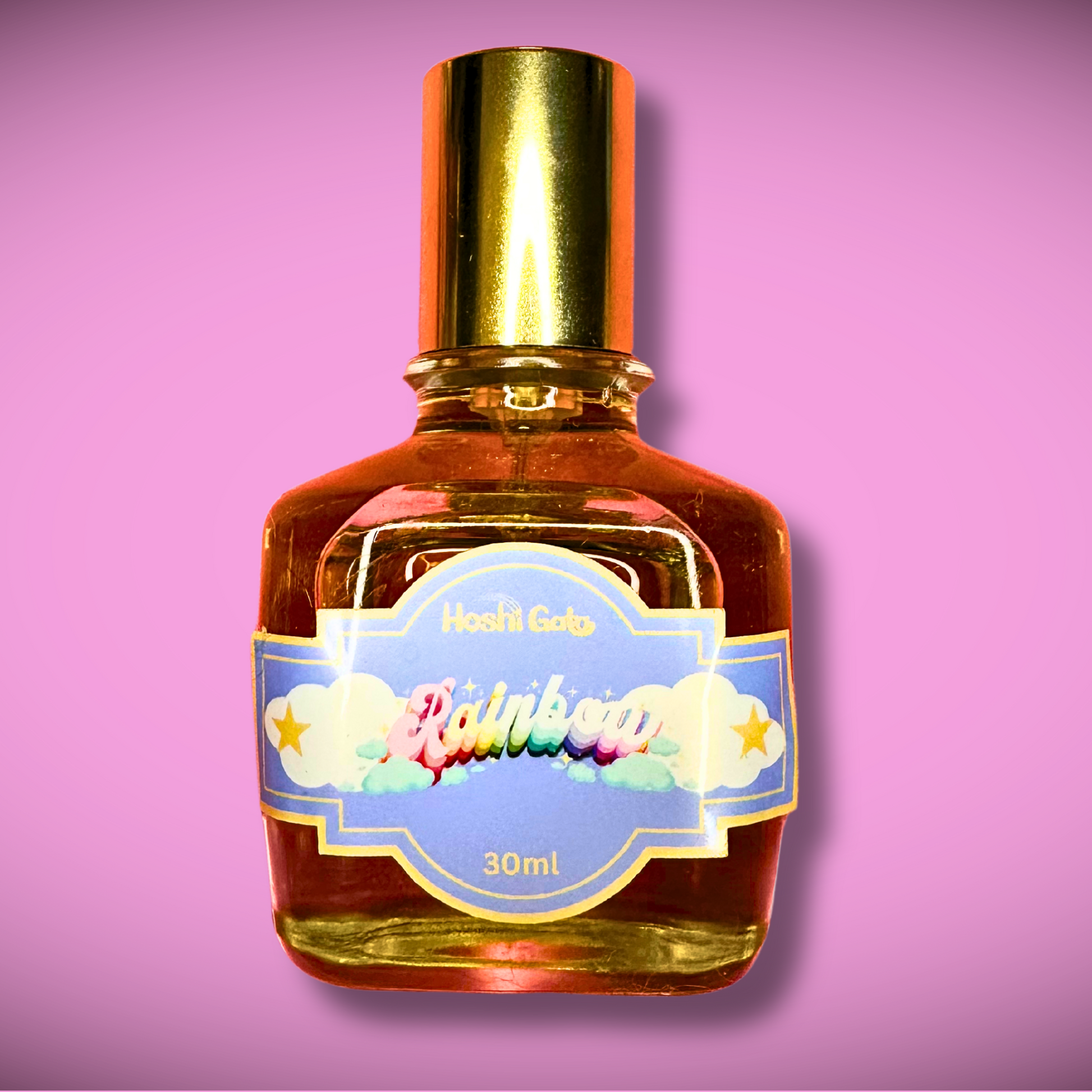 Bottle of Rainbow on a pink background