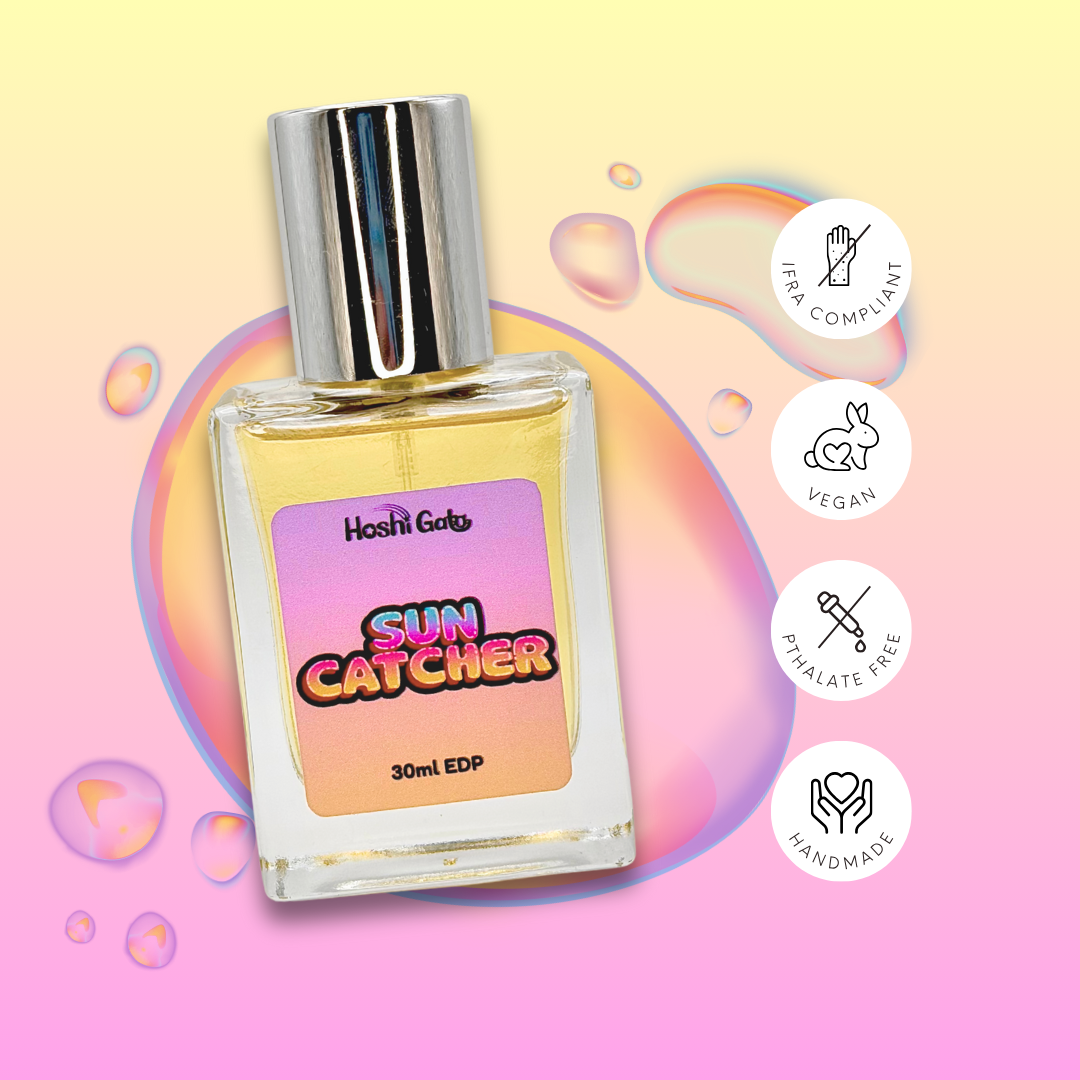 Sun catcher on a colorful background with tags stating it is IFRA compliant, vegan, handmade, and phthalate-free.